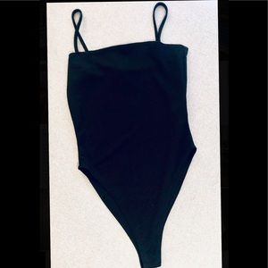Never worn “Slinky Skinny Strap Bodysuit” BOOHOO